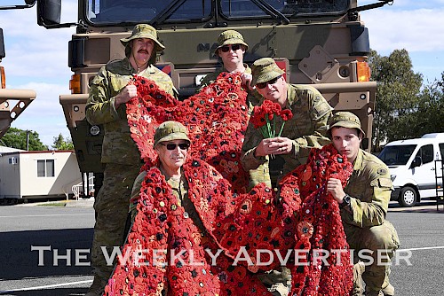 Horsham Army Reserve unit, 128 Transport Troop members, from left,  Pte Gerard Emmett, Cpl Charlie Sampson, Pte Brendan O'Connor, Sgt Gareth Lane, and Cpl Jono Spence with poppies for Anzac Day.