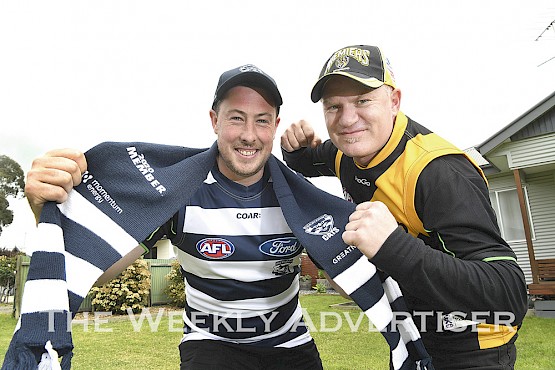 BugROff Stain Busters owner Aaron Jennings and his employee Heath Kinnersly will have a fun week of work with Geelong and Richmond playing off in the AFL Grand Final at the weekend.