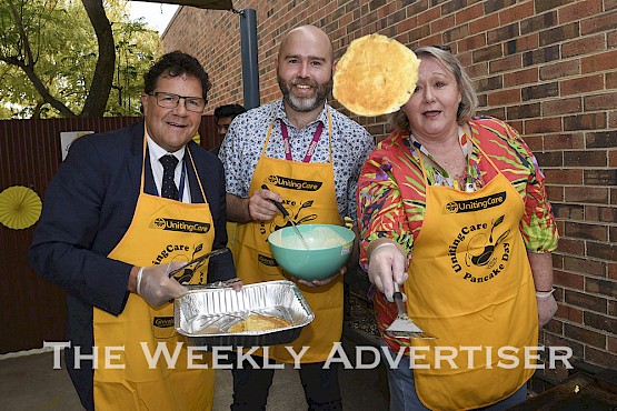 GWMWater chief executive  Mark Williams, Uniting Wimmera chief executive Josh Koenig and Headspace Horsham manager Liz Rowe at Uniting Wimmera's pancake day.