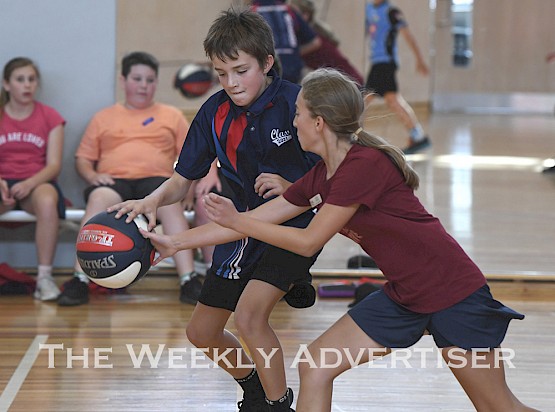 Zac McAlpine and Adele Joseph in Horsham Primary School's ‘all-day’ basketball-a-thon as a Relay For Life fundraiser.