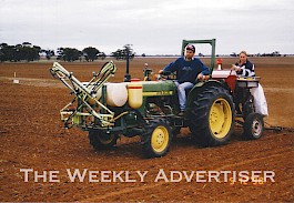 Birchip Cropping Group farmers John Stutchbury and Liz Ferrier on a seeder in December 1998.