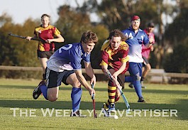 BATTLE: Jacob Dixon, Kaniva Cobras, and Kai Hoye, Warrack Hoops, attempt to take control of the ball. Picture: SIMON KING