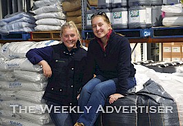 HANDS ON: Western Ag’s Laura Millard, left, shows Longerenong College second-year student Lynae Howlett through the company’s Horsham site. Picture: PAUL CARRACHER