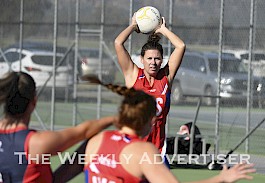 AWARDED: Kalkee’s Hayley Thomas holds the ball and eyes her teammate during the Kees’ win against Laharum. Thomas was player of the match, winning the Michele Mibus Medal awarded in honour of the late Laharum life-member. Picture: PAUL CARRACHER