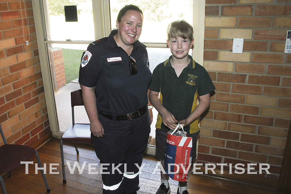 Paramedic Amy Brown dropped by Ss Michaels and John's assembly to recognise student Harry Wilson for his quick actions in a medical emergency.