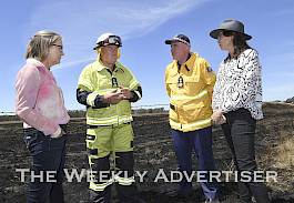 Fire Rescue Victoria incident controller Mark Gunning, Premier Jacinta Allan, CFA chief officer Jason Heffernan and Minister for Emergency Services Jaclyn Symes inspect fire damage at Dadswells Bridge.