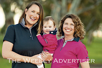 SPOILT FOR CHOICE: Cat Denman and daughter Alana, with Amanda Kroehn, wear Out and About Clothing designs.