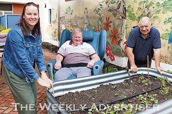 PASSIONATE: Dimboola Meaningful Life co-ordinator Megan Naylor with residents Graeme Bond and the late David Bugg in a section of the Bretag Garden.