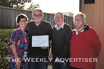 GRATEFUL: Prostate cancer specialist nurse Mandy Johns, with Wimmera prostate cancer support group members Brian Nagorcka and Jack Janetzki, right, present urologist Richard McMullin with a certificate of appreciation. Picture: BRONWYN HASTINGS