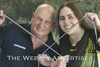 CHECKMATE: Wimmera Football Netball League chairman Peter ‘Billy’ Ballagh and Horsham District Football Netball League representative Jayde Ellis promote the mental health rounds involving clubs and umpires. Picture: PAUL CARRACHER