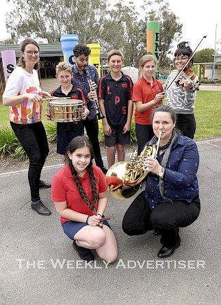 Melbourne Symphony Orchestra members Rosie Savage, front, Thea Rossen, Luke Carbon and Madeleine Jevons entertain Laharum Primary Shool students Selina Winfield, front,  Josh Hutchinson, Sam Suholz and Ava Knight ahead of the orchestra's concerts in Horsham in November.
