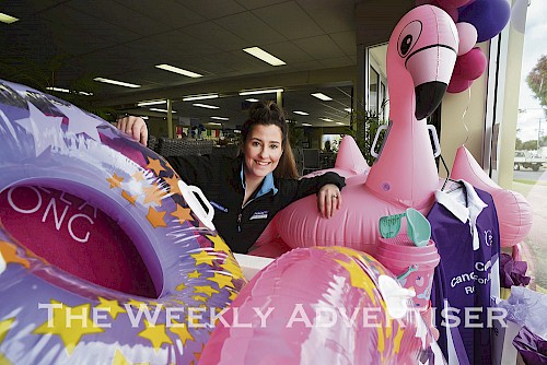 Ally Stainton at Wimmera Spas and Pools with their Relay For Life  Paint the Town Purple/Pink promotion.