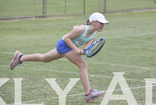 Hannah Heard playing in a junior points tournament at Horsham Lawn.
