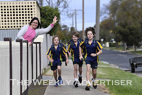 WE CAN’T WAIT! Billie Combe and her sons, from left, Oscar, year one, Thomas, year three, and Jack, year five, of Horsham, are delighted with news students will soon be going back to classroom learning as part of a gradual easing of COVID-19 restrictions. Mrs Combe said her family was ‘very’ excited after hearing students in grades prep to year two and years 11 and 12 would return to school on May 26 and others in years three to 10 on June 9. “We’ve all had enough of being at home,” she said. Picture: PAUL CARRACHER