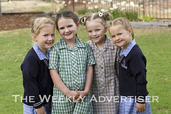 PREPPED AND READY TO GO: From left, Ava Webb, Georgia Clark, Lilly Brown and Romy Olston show off their new school uniforms. The four friends are keen to start prep next week, albeit at different schools. Ava and Romy will attend Horsham’s Holy Trinity Lutheran College, Georgia will attend Haven Primary School and Lilly, Ss Michael and John’s Primary School. The girls are among thousands of students across the region set to start school from Wednesday next week.  Picture: PAUL CARRACHER