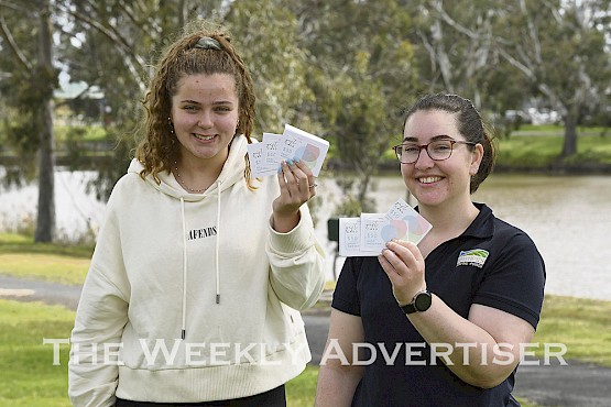 The Weekly Advertiser Spring Photo Competition winnera Lily Bolton and Ruth Addlem with their prizes.