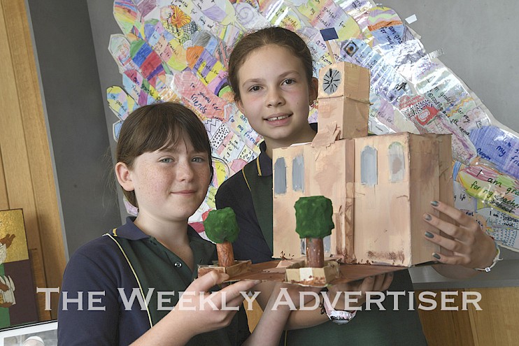 St Patrick's Primary School Stawell Grade 5 students Rose Collins and Bonnie Kuchel with their award-winning 3D artwork of Stawell Town hall. The girls won first place at this year's Stawell Show. Students at the school used recycled materials to create models of buildings in the community. Stawell Agricultural Society presented a craft and cookery competition and displayin lieu of  a 2021 Stawell Show.