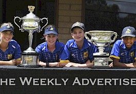 ASPIRATIONS: Wimmera 12 and under team members, from left, Adele Joseph, Emma Streeter, Harry Allan and Eli Bailey pose with Australian Open men’s and women’s trophies that were on display at Tennis Victoria Inter-regional Country Championships in Horsham. Male competitors at the Open play for the Norman Brookes Challenge Cup and women play for the Daphne Akhurst Memorial Cup. Both cups were on show as part of an ‘AO on the Road’ tour. Former national tennis star, 1992 Australian Olympic bronze medallist and dual grand-slam mixed-doubles champion Nicole Bradtke was also a guest at the Horsham tournament.  Picture: PAUL CARRACHER
